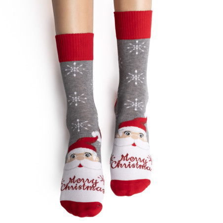 Świąteczna skarpetka z Mikołajem i napisem "Merry Christmas"